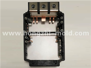 Injection molded embedded metal parts